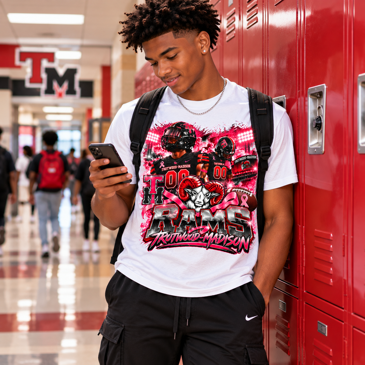Trotwood-Madison Rams Football Breast Cancer Awareness T-Shirt | Pink Out Game Day Spirit Tee